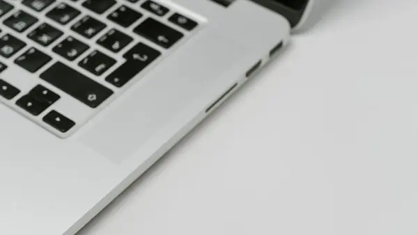USB security key next to a laptop